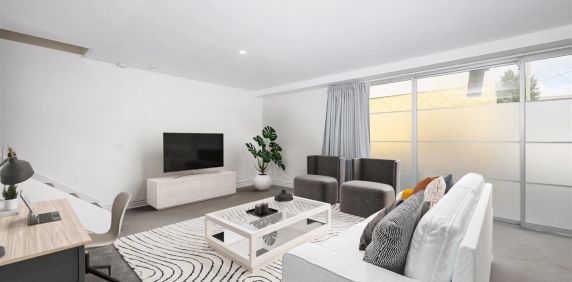Contemporary Two-Level Apartment in Coveted Chapel Street Precinct - Photo 2