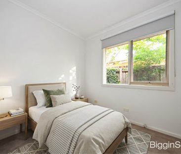 Light-Filled North-Facing Living in a Convenient Location - Photo 4