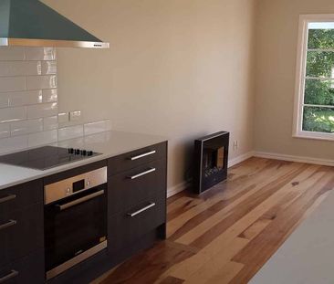 Charming 3BR Home with Deck & Garden - Photo 3