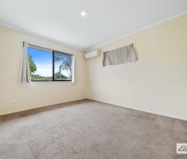 Spacious Family Home with Modern Amenities and Ample Outdoor Space - Photo 2