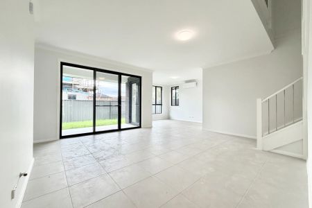 Brand-New, Effortless Modern Living in a Light-Filled Family Home - Photo 3