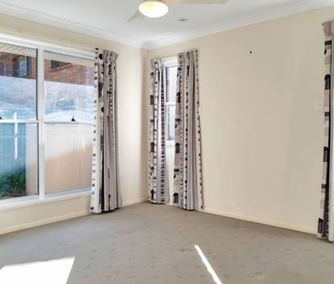 Modern Unit Perfectly Located - Photo 1