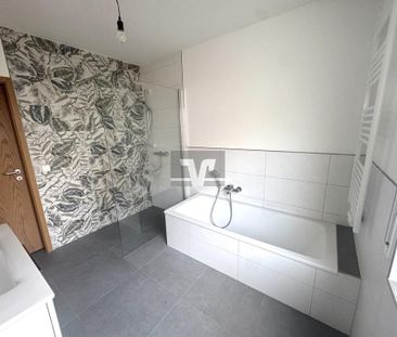 Erstbezug nach Sanierung: Stilvolle 2,5-ZKB mit EBK und Garten in M... - Photo 1