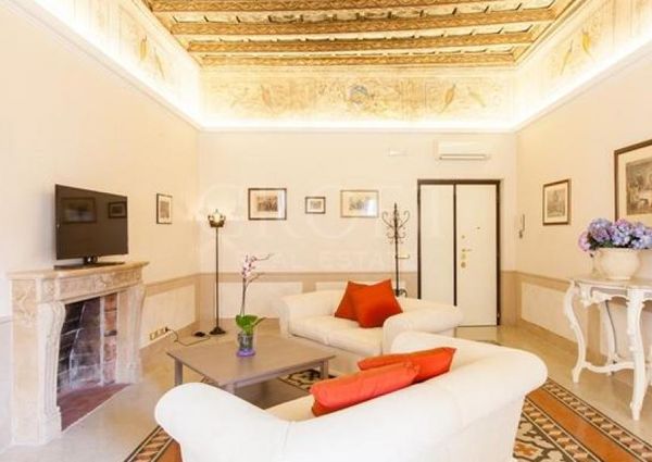 Center-Historic Jewish Quarter: Elegant apartment situated in beautiful Palazzo Nobiliare. Entrance, spacious living with original wood frescoed ceilings, large modern dining and kitchen, 4 bedrooms, 4 Baths, small terrace. #1527