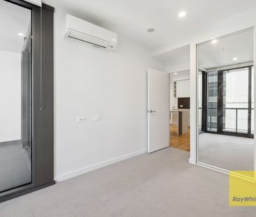 City Central Unfurnished Apartment with Resort-Style Amenities - Photo 6