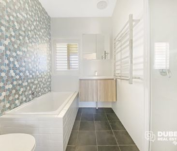 COZY THREE BEDROOM HOME - Photo 5