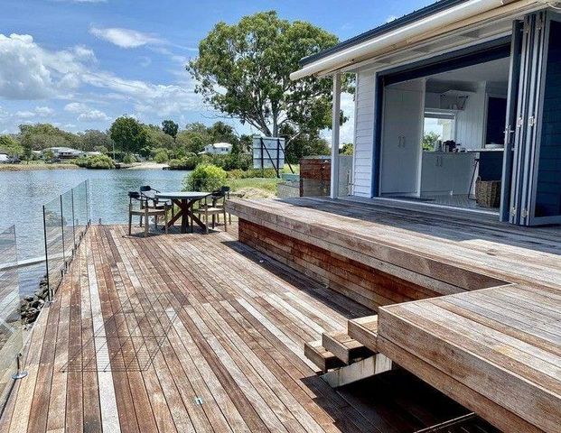 Furnished Luxury Waterfront Queenslander cottage on the Gold Coast | Short Term Rental - Photo 1