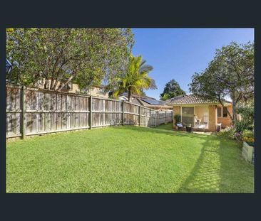 Charming Solid Brick Family Home in Sought-After Location - Photo 1