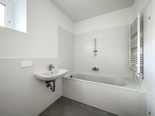 Dein Gartenparadies im Erdgeschoss: Geräumige 2-Zimmerwohnung mit schöner Grünfläche im Wildgarten - Foto 1