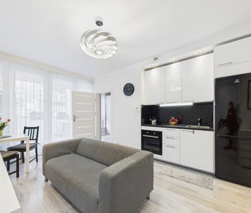 2 pokoje, balkon i garaż – komfort i styl w jednym - Zdjęcie 1