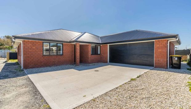 Modern easy care and spacious - Photo 1
