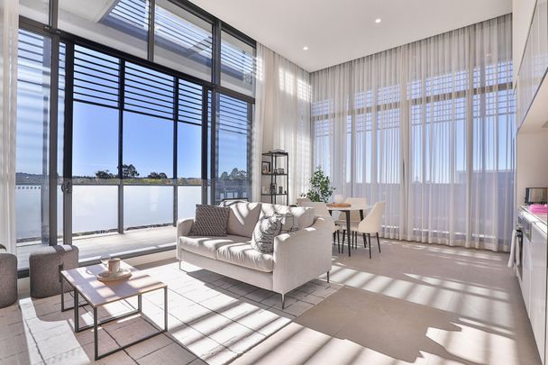 Top Floor Living At It's Finest! - Photo 1