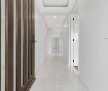 BRAND NEW LIGHT FILLED FAMILY HOME IN BEVERIDGE - Photo 3