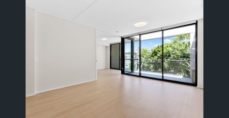 Sunny, renovated and convenient living in the Heart of the Lower North Shore - Photo 4