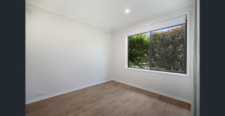 Modern 2-Bedroom Unit with Private Courtyard + Parking! - Photo 2