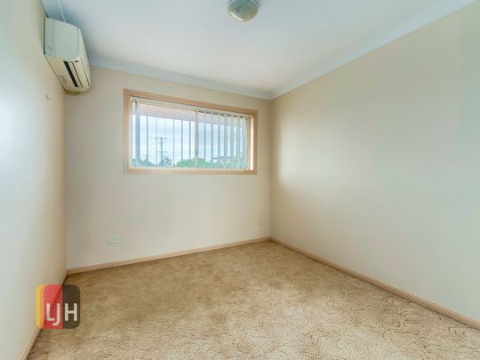 2 BEDROOM TOWNHOUSE WITH COURTYARD MAINTENANCE INCLUDED! - Photo 1