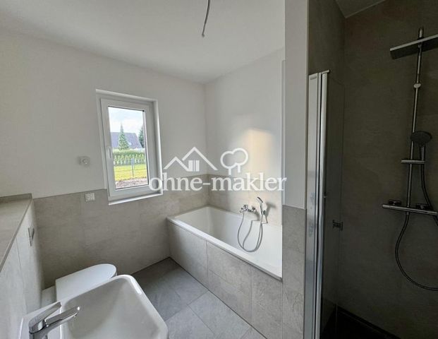 Erstbezug: Helle 3-Zimmer Wohnung mit Einbauküche, Terrasse, Garten und Stellplatz - Photo 1