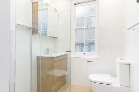 SITUATED AT THE REAR OF BUILDING - RENOVATED BEACHSIDE ABODE - Photo 5