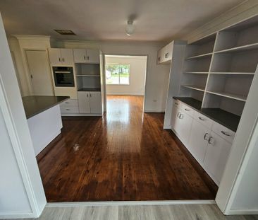 Spacious 4-Bedroom Family Home with Modern Upgrades - Photo 3
