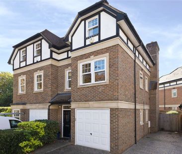 A bright family home in a gated development within the catchment area for Cleves School and 0.6 miles to Walton-On-Thames station. - Photo 2