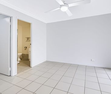Back Property - Spacious Family Living with Solar, Water Tanks & Mo... - Photo 6