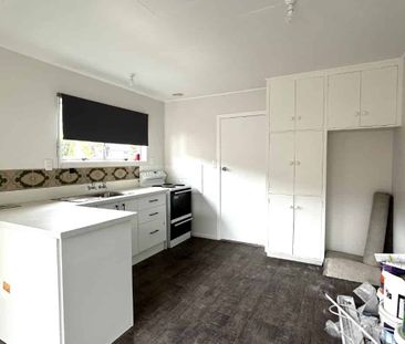 Freshly Updated 2 Bedroom Home Close to Schools and City - Ready Soon! - Photo 3