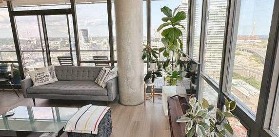 Elegant 2 Bed, 2 Bath Corner Suite with Waterfront Views and Patio - Photo 2