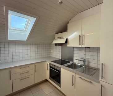 2.5-Dachzimmerwohnung im 2. Stock mit Balkon - Foto 4