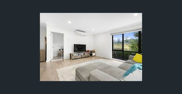 Stylish 3-Bedroom Home with Open Living - Photo 1