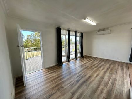 FRESHLY UPDATED HOME IN A FAMILY-FRIENDLY LOCATION - Photo 2
