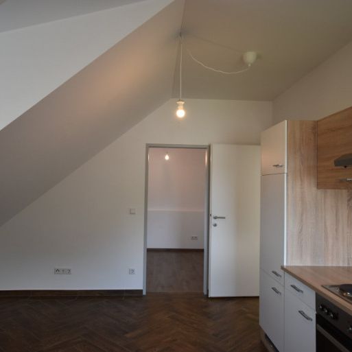 "GRÖDIG - Moderne und gemütliche 2 Zimmer Dachgeschosswohnung" - Foto 1
