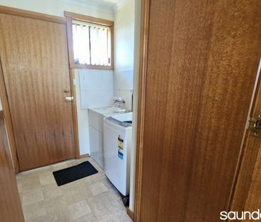 Unit with brand new bathroom - Photo 2