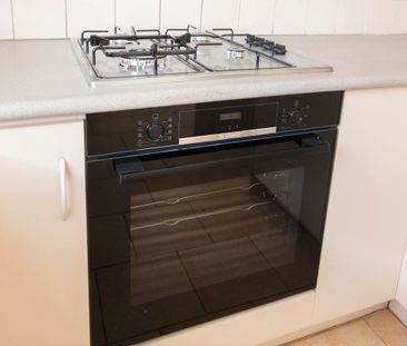 This beautifully presented, spacious three-bedroom home is ideally ... - Photo 2