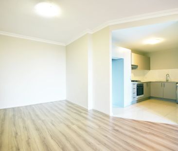 Spacious Unit With Floorboards - Photo 5