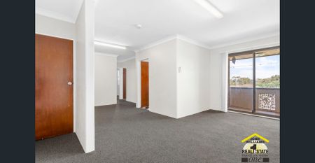 "Neat & Spacious 2-Bedroom Unit" - Photo 2