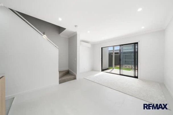 “Immaculate 2-Bedroom Townhouse with Natural Light – Now Leasing” - Photo 1