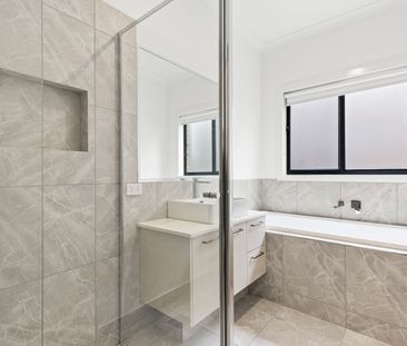 Spacious 4-Bedroom Home with Modern Features in Wollert - Photo 6