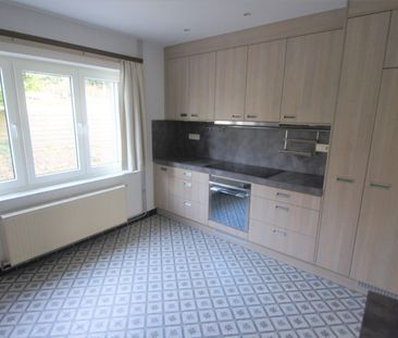 Mooi gelegen woning met tuin/terras, 2 slpks en garage - Photo 5