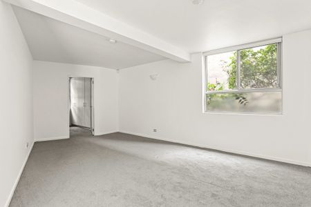 Sophisticated and Stylish Two Bedroom Apartment with Parking - Photo 3