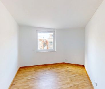 Familienfreundliche 4-Zimmer-Wohnung mit Loggia und zwei Bädern - Photo 4