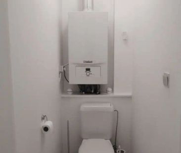 Ongemeubeld lichtrijk appartement met twee slaapkamers - Photo 6