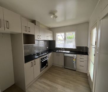 Inviting two-bedroom unit tucked away from the main road down a ser... - Photo 2