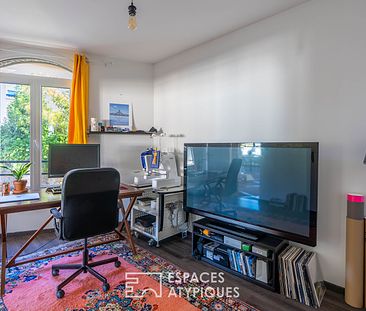 Bel appartement en duplex aux volumes généreux dans le bourg de Indre - Photo 4