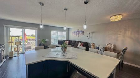 Stylish Auburn Bay Duplex With Garage & Newly Finished Basement - Photo 3