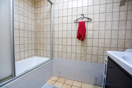 Leuke rijwoning met zij-ingang naar grote tuin - Photo 5