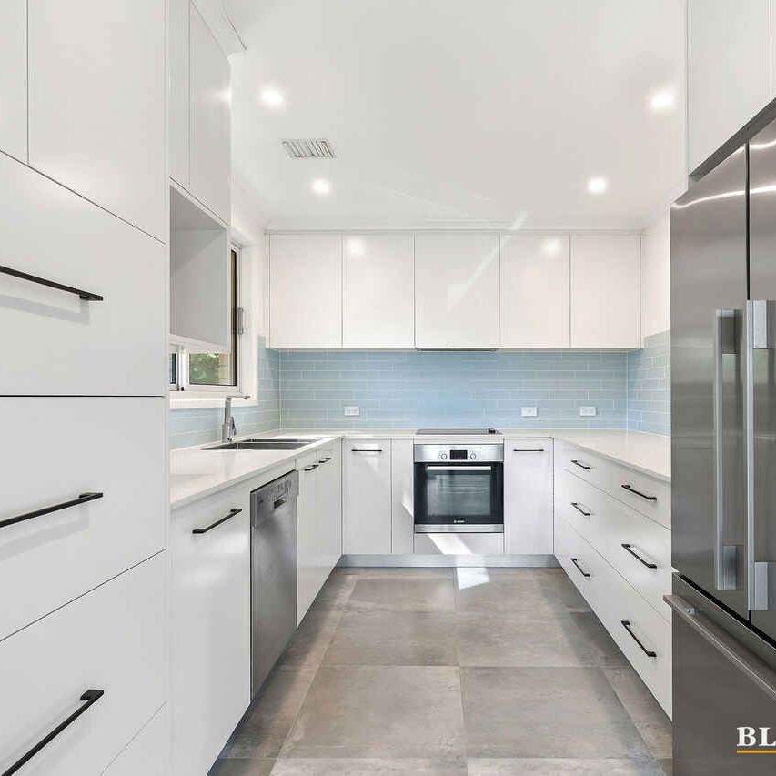 Modern two bedroom home with large private yard - Photo 1