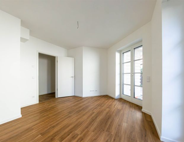 Townhouse mit, vier Ebenen u.a. mit EBK, Studio, Garten und privatem TG-Zugang inkl. 2 Stellplätzen - Foto 1