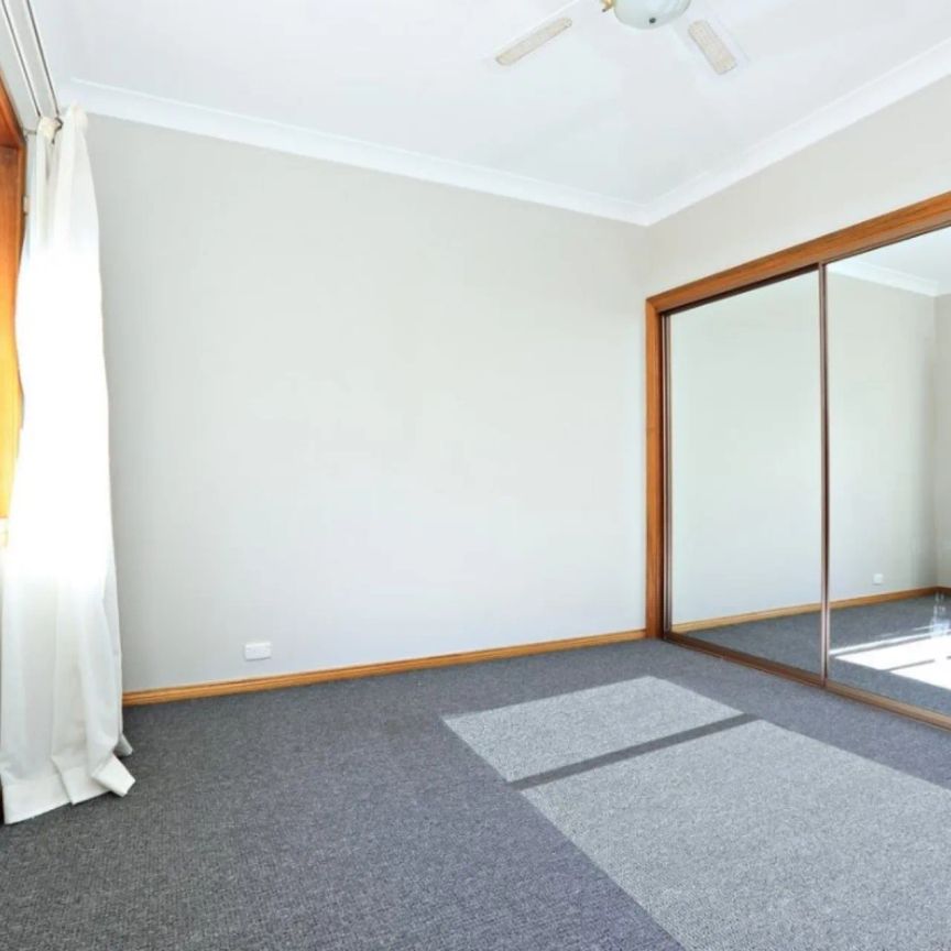 Light-Filled Apartment Offering Comfort and Convenience - Photo 1