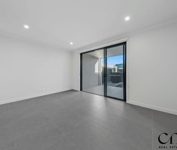 Embrace Modern Living in this Stunning Townhouse! - Photo 1