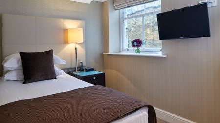 Executive 2-Bedroom Apartment For Rent - Photo 2